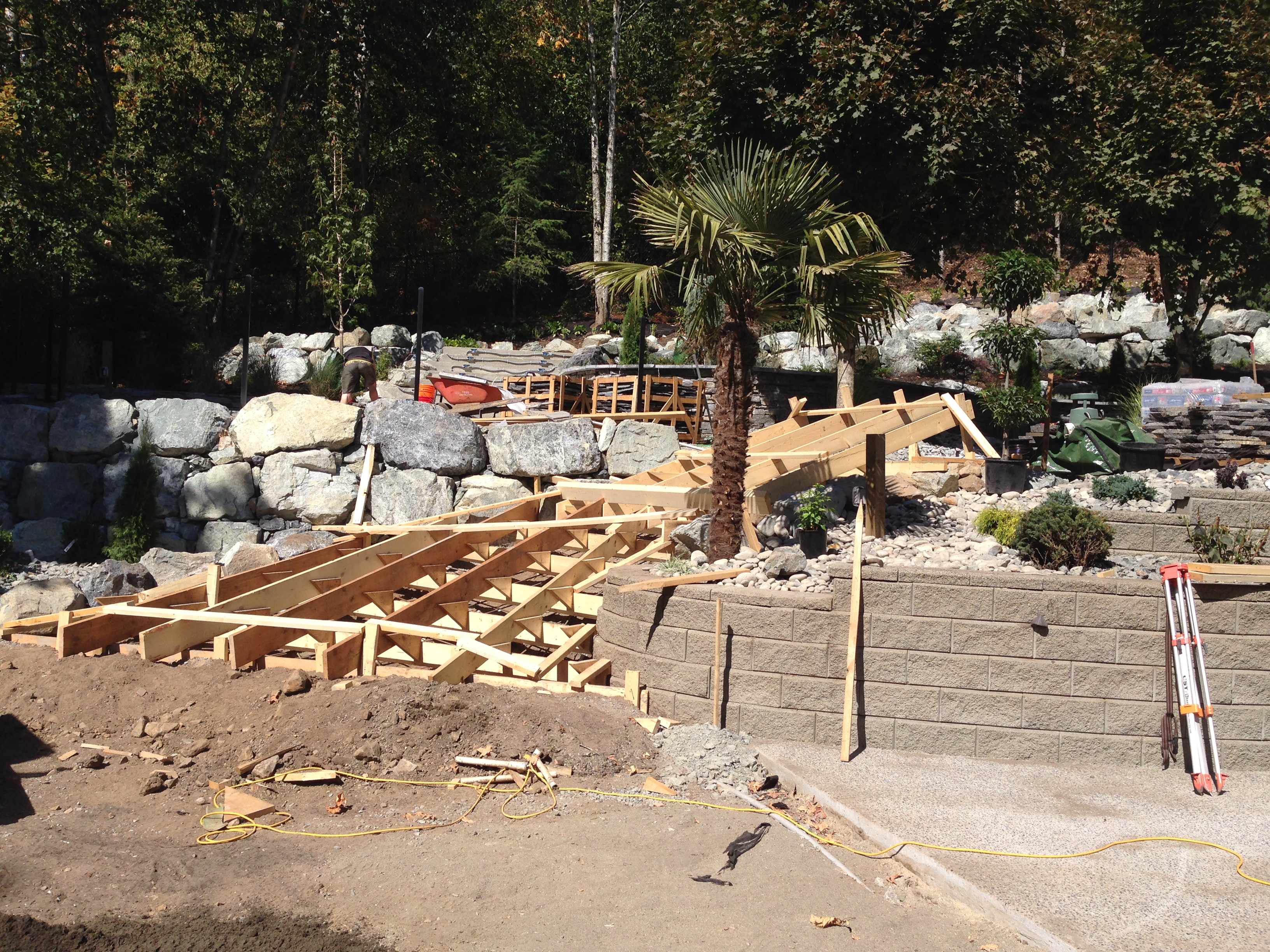 Freshly poured custom concrete staircase prior to stone veneer installation
