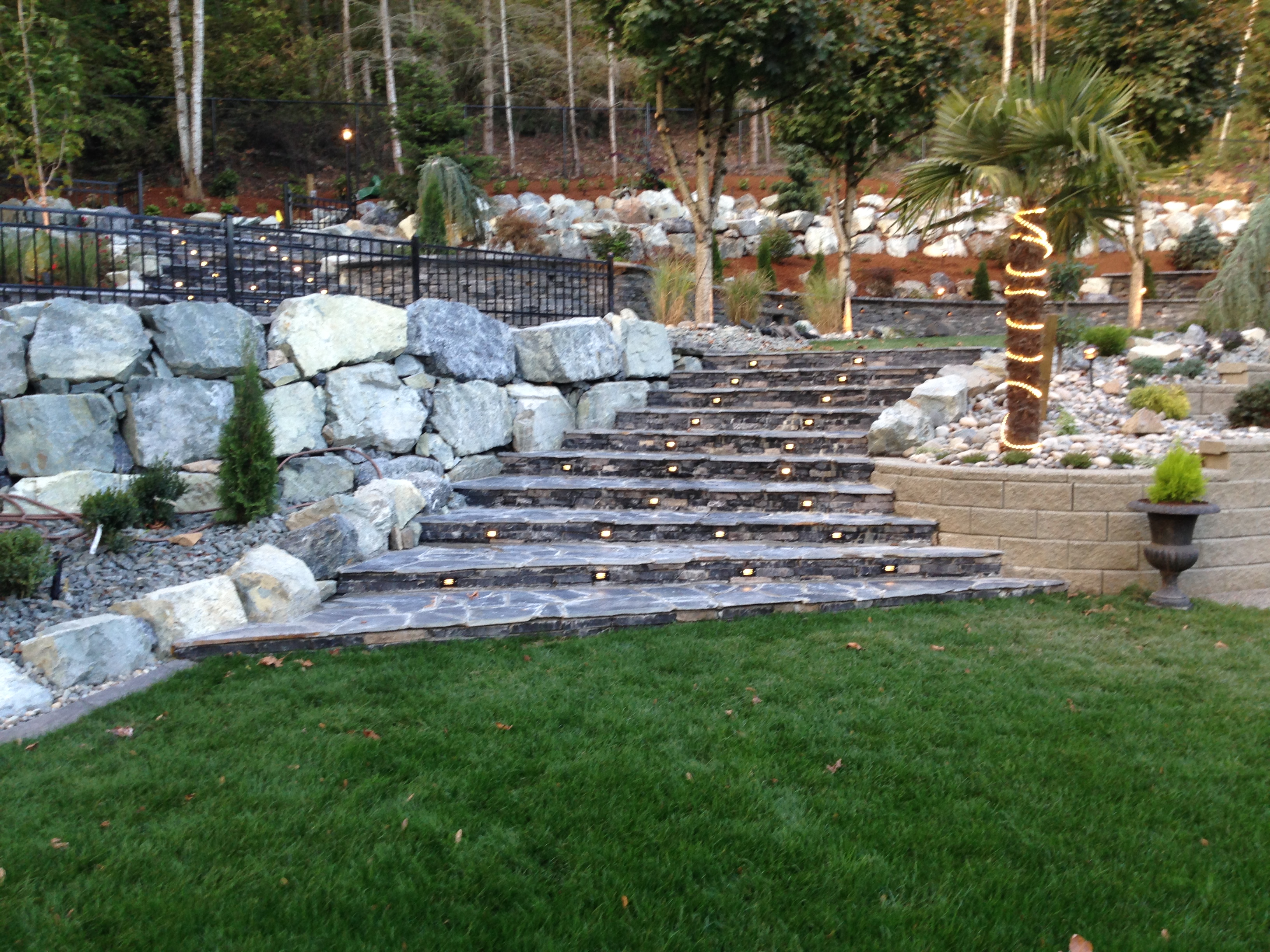 Completed custom concrete staircase with stone veneer in Abbotsford, B.C.