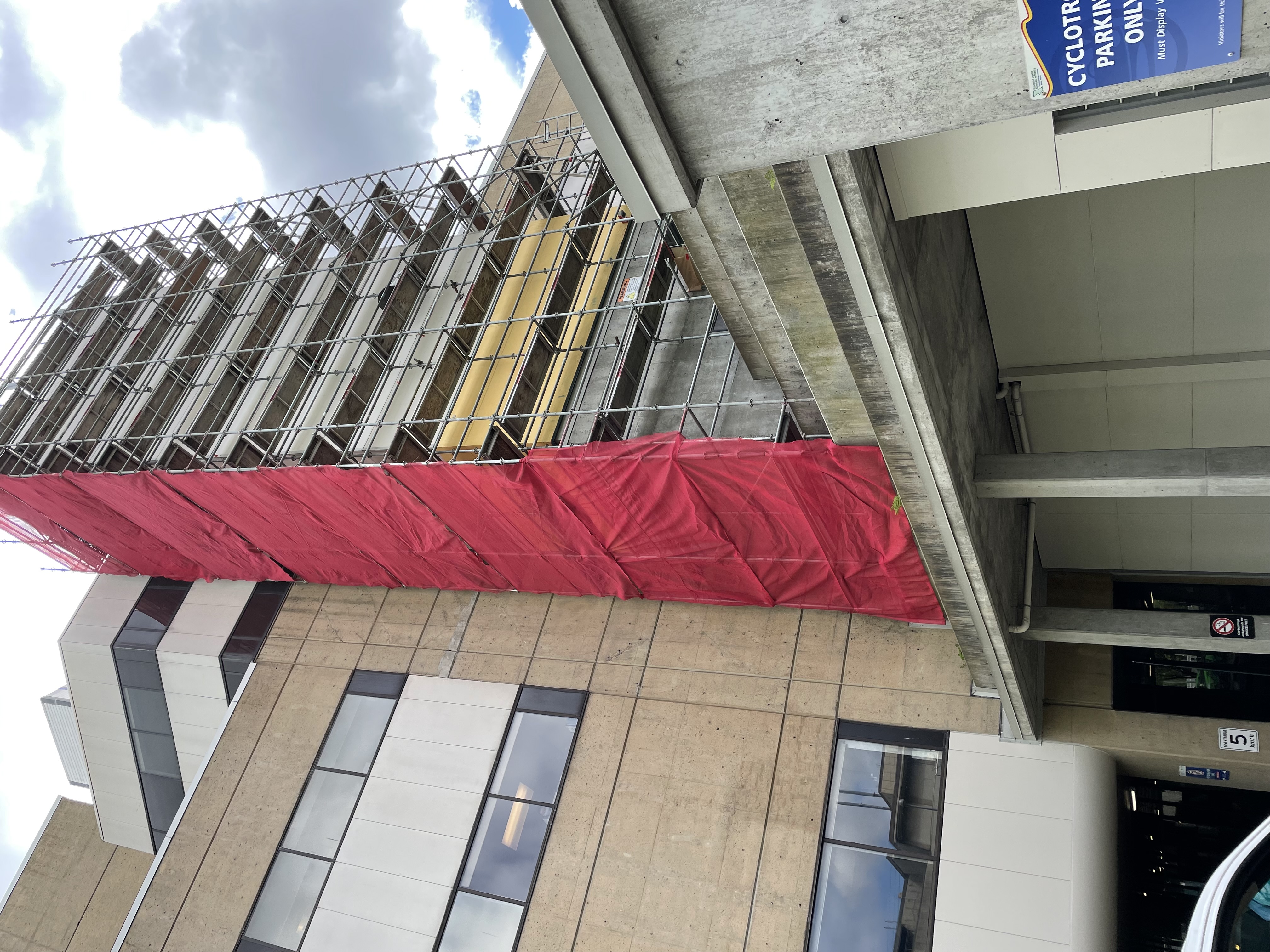Scaffolding and containment installed for cooling tower refinishing work at BC Cancer Agency