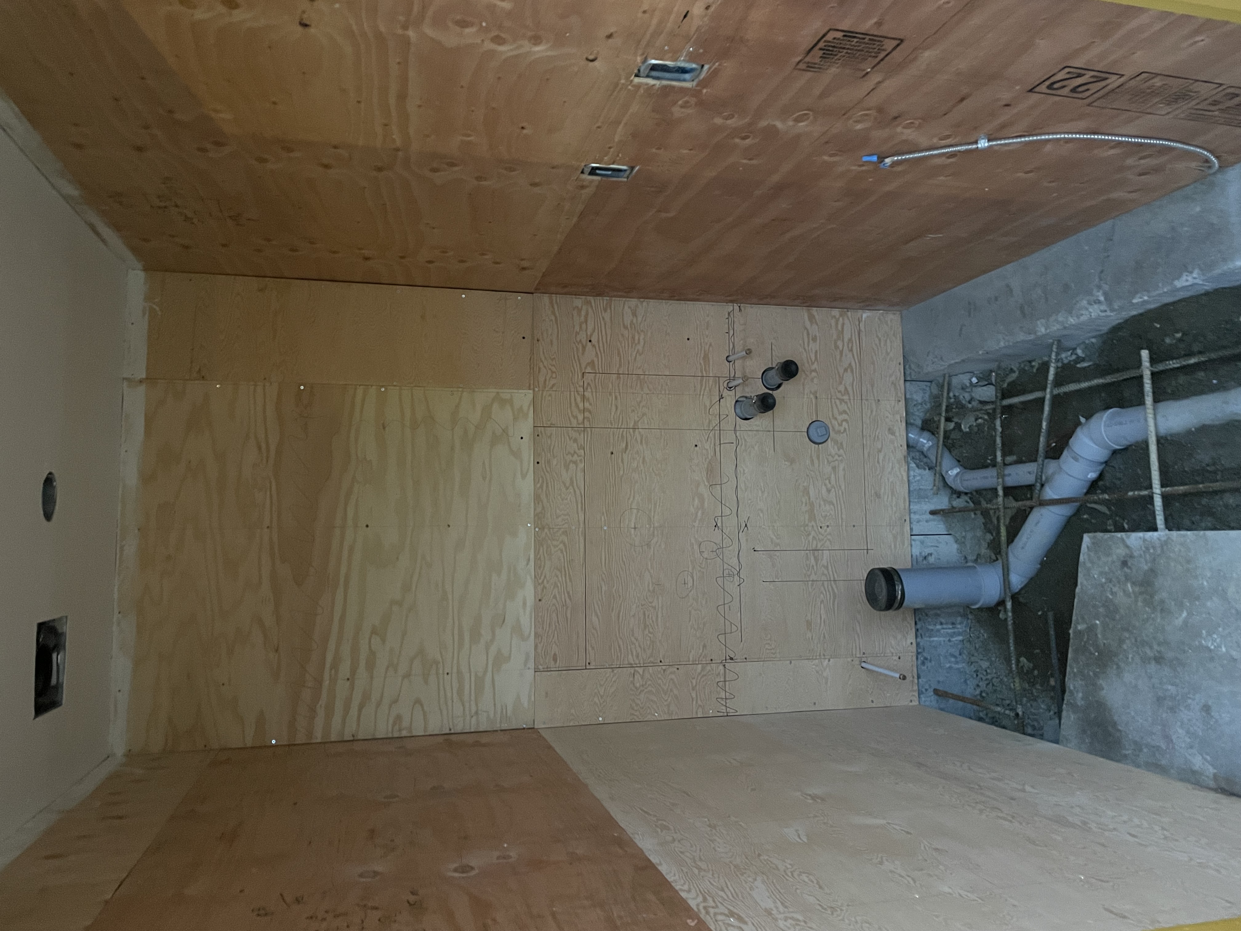 Plumbing rough-in for new washroom construction at Finning Canada Surrey facility
