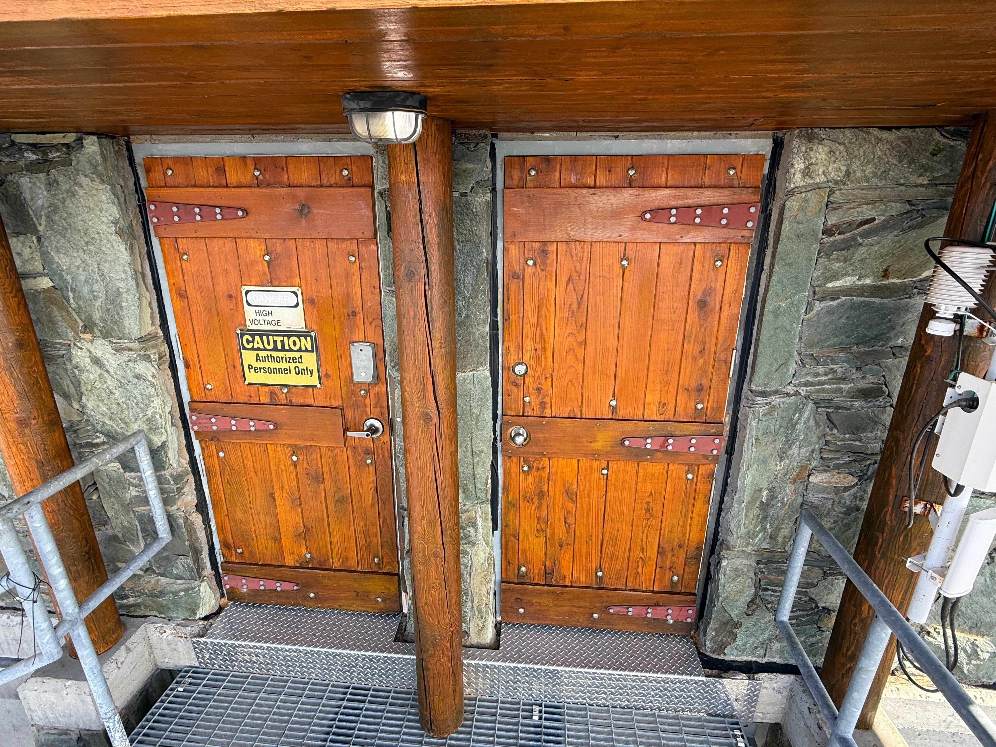 Close-up of refinished timber doors on the Rogers Communications equipment shelter at Whistler Mountain