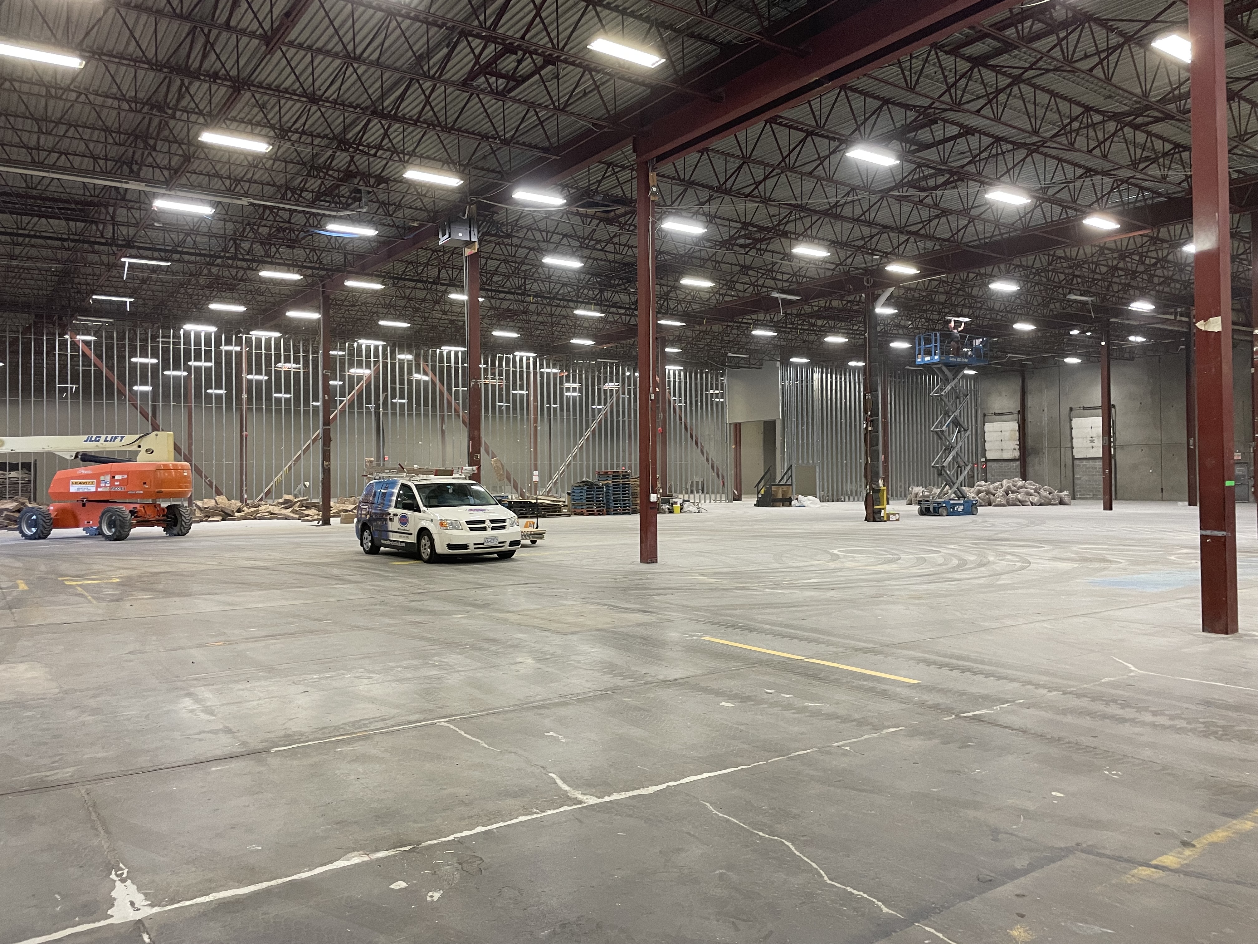 Large warehouse-style stage area under alteration at Warner Bros. Studios in Langley